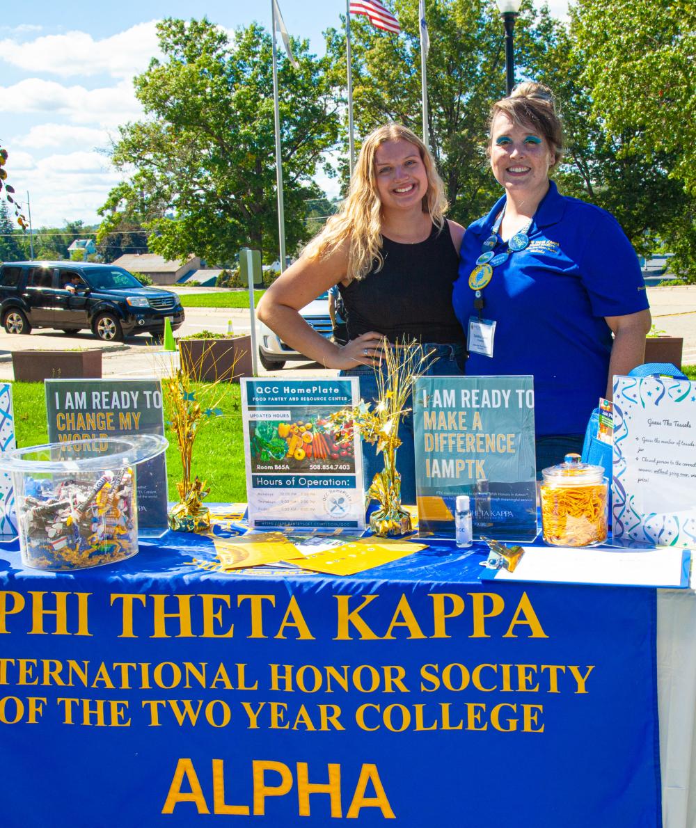 A recruitment booth for PTK on the Quad