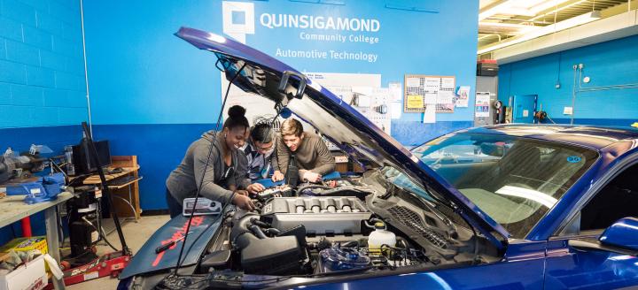 QCC students work on a vehicle