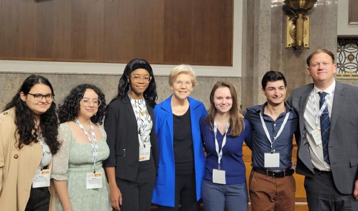 QCC Student Trustee Maria Mikhaeil (left) with Senator Elizabeth Warren (center) and other student representatives