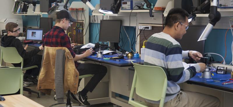 Students working on projects in the electronics lab