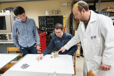 QCC Professor shows students equipment