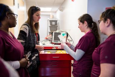 Students learn the use of nursing tools