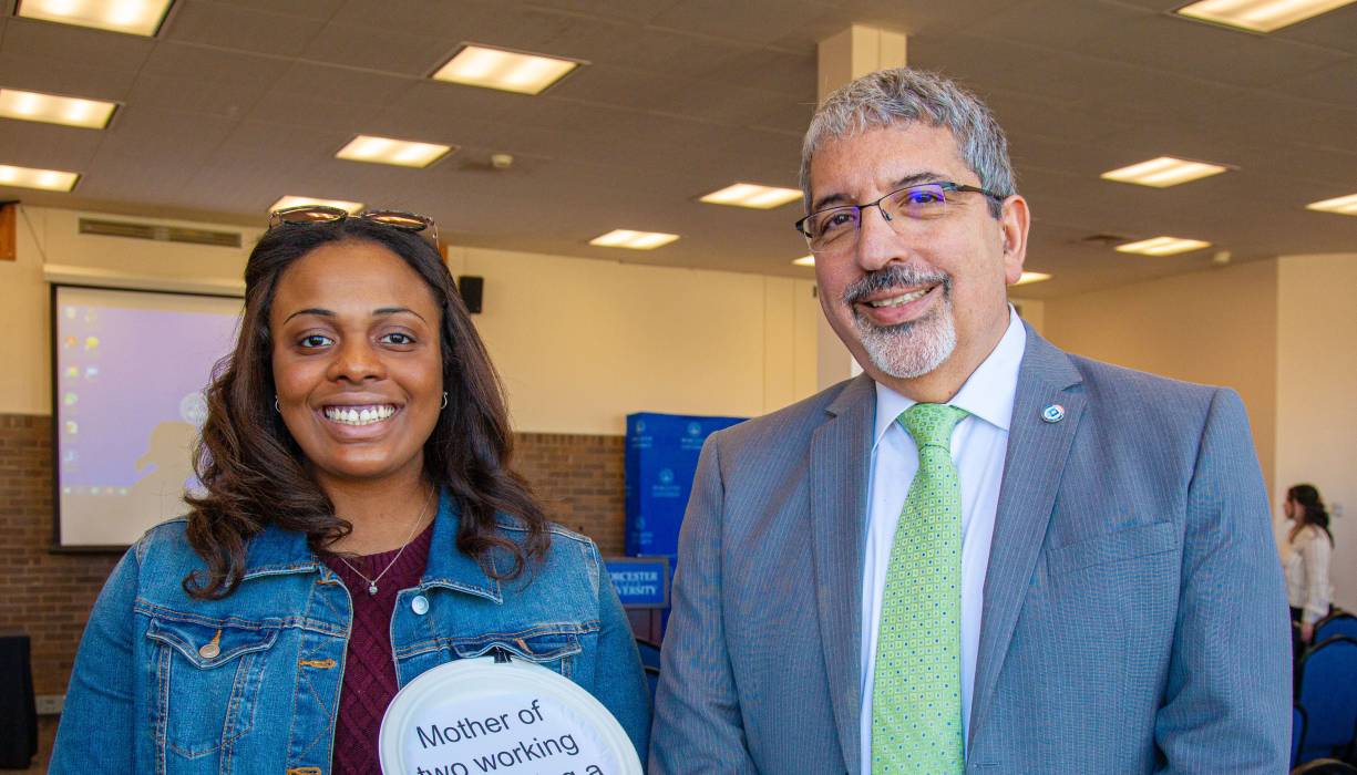 Student Brittany Richards and QCC President Luis G. Pedraja, Ph.D.