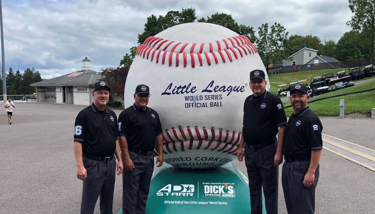 From left: 2021 LLWS umpires David Cofield, Mike Debelak, Brian Henry and Ricci Hall.