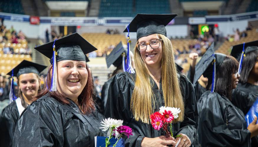 Excited grads at QCC's 2023 commencement ceremony