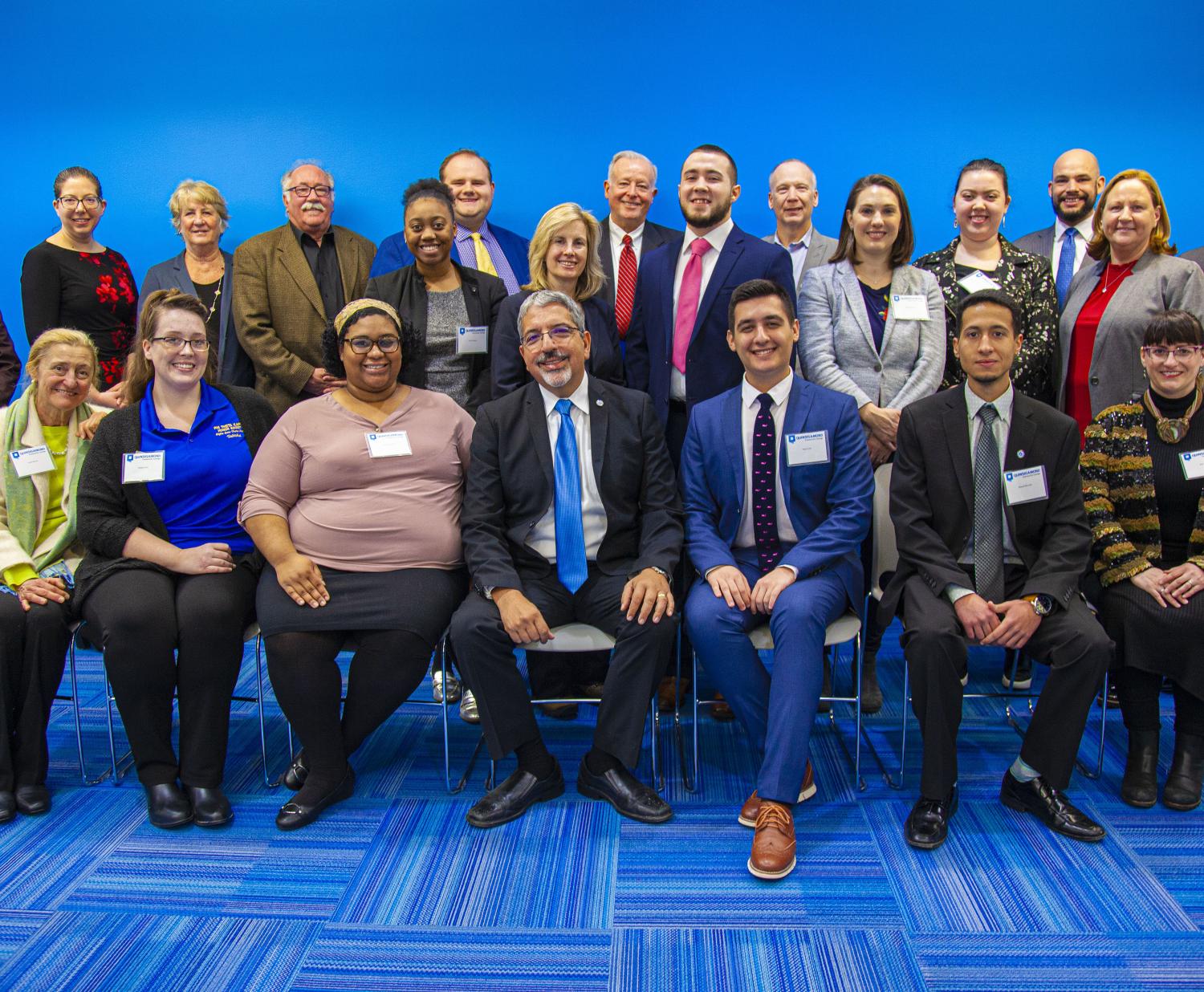 Members of the QCC Foundation pose with the community at QCC’s Legislative Breakfast