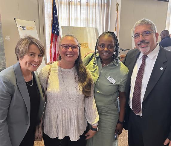 Governor Maura Healey, Karen Grant, Michelle Tufau and Dr. Luis Pedraja