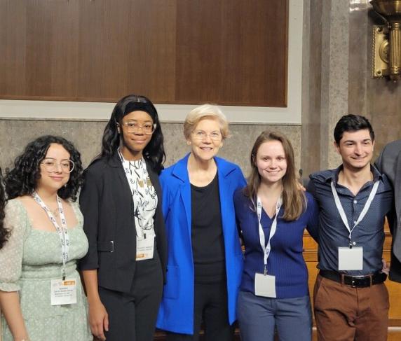 QCC Student Trustee Maria Mikhaeil (left) with Senator Elizabeth Warren (center) and other student representatives