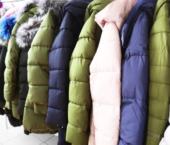 coats hanging on a rack