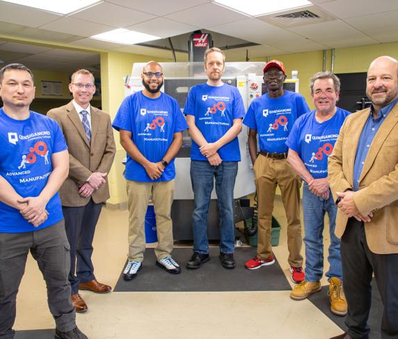 Students receiving Haas CNC certificates with David Schmidt and Professor Lee Duerden (right).