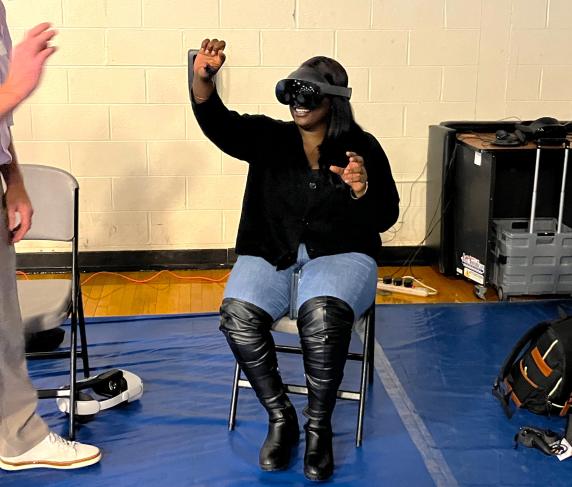 A student uses virtual reality technology during the Transfer and Technology Fair.