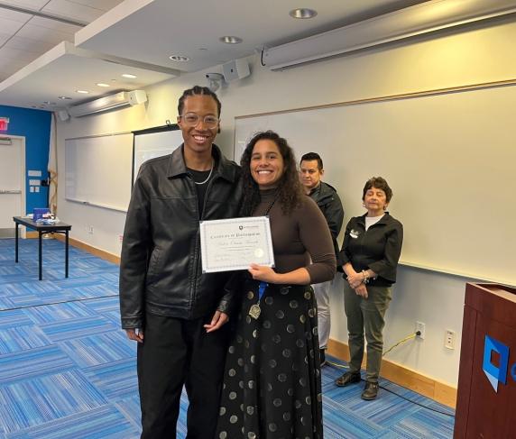 Coordinator of the Future Focus Program Gilmarie Vongphakdy (right) with a student