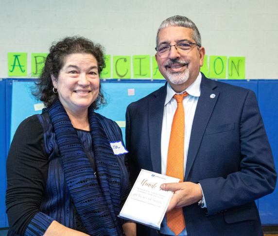 Professor Lisa Connelly Cook with President Dr. Luis Pedraja