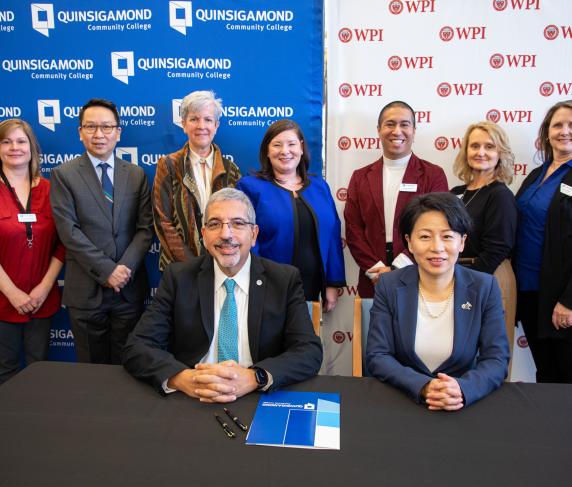 (back row, from left) Clerk IV for Career Services & CPL Brenda Kuchnicki, Assistant VP of Academic Affairs Kevin Li, Interim VP of Academic Affairs Kathy Rentsch, Executive Director of Advising, Testing, Career & Transfer Services Amy Carmack, Career & Transfer Counselor Oscar Chavez, Coordinator of Transfer & Articulation Beth Fullerton and Asst. Director of Career and Transfer Services Laura Hunter. (front row, from left) QCC President Dr. Luis Pedraja and WPI President Dr. Grace Wang.