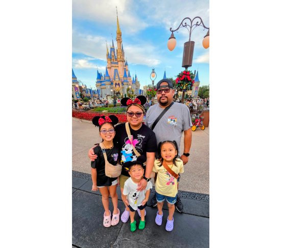 Lina Un with her husband and children
