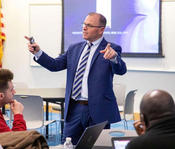 Adjunct Professor Dr. Larry Sasso at the Alumni & Friends Learning Series