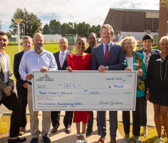 (From left) Jorgo Gushi, President, QCC Foundation; Sean Nelson, Interim VP of Finance & Administration; Lee Duerden, Prof. of Manufacturing Technology; Dennis Dean, Dean of Computing & Applied Technologies; Melanie Bonsu, Community Engagement Manager, Saint-Gobain; Sean Harris, Director of Community Engagement; Pat Baliva, VP of Sales, Saint-Gobain; Dr. Linda Maykel, Chair, QCC Board of Trustees; Deb Spotts, Chief Advancement Officer/Exec. Director of Development; and Mari Gonzalez, QCC Board of Trustees