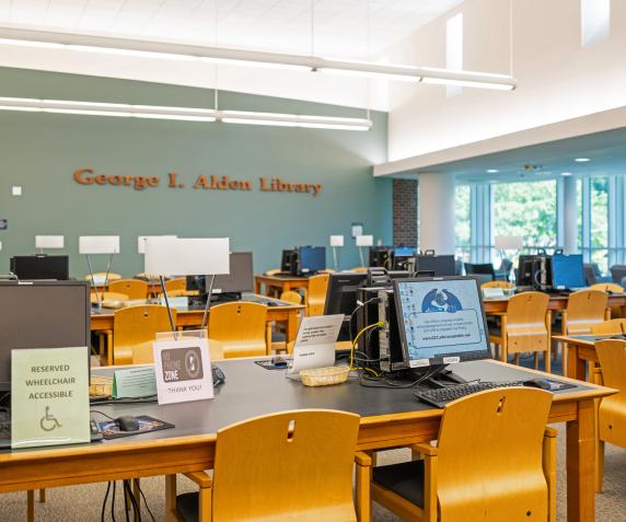 The Alden Library’s work area with computers and desks