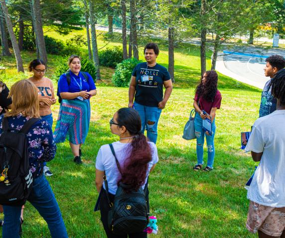 students gather on the lawn at QCC to start off orientation