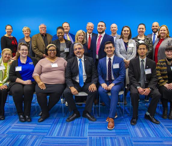 Members of the QCC Foundation pose with the community at QCC’s Legislative Breakfast