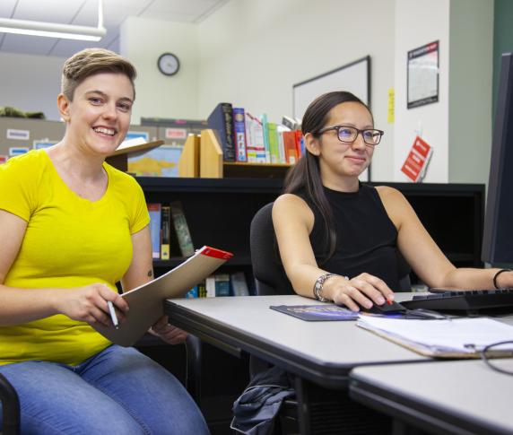 Student being tutored in the Writing Center