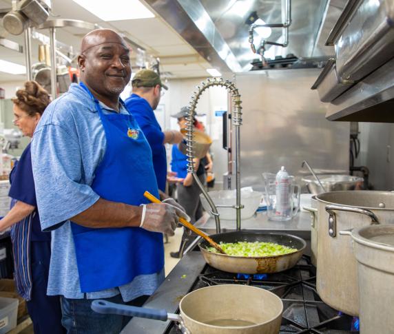 A student in the senior center kitchen