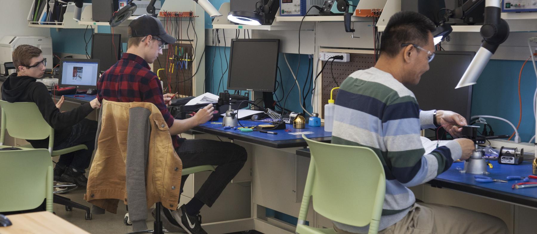 Students working on projects in the electronics lab