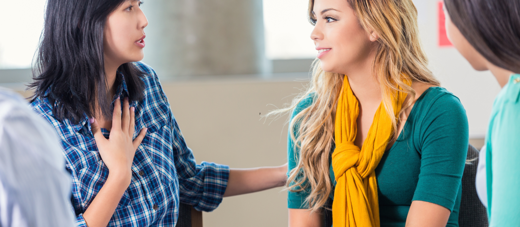 A group of students works with a counselor