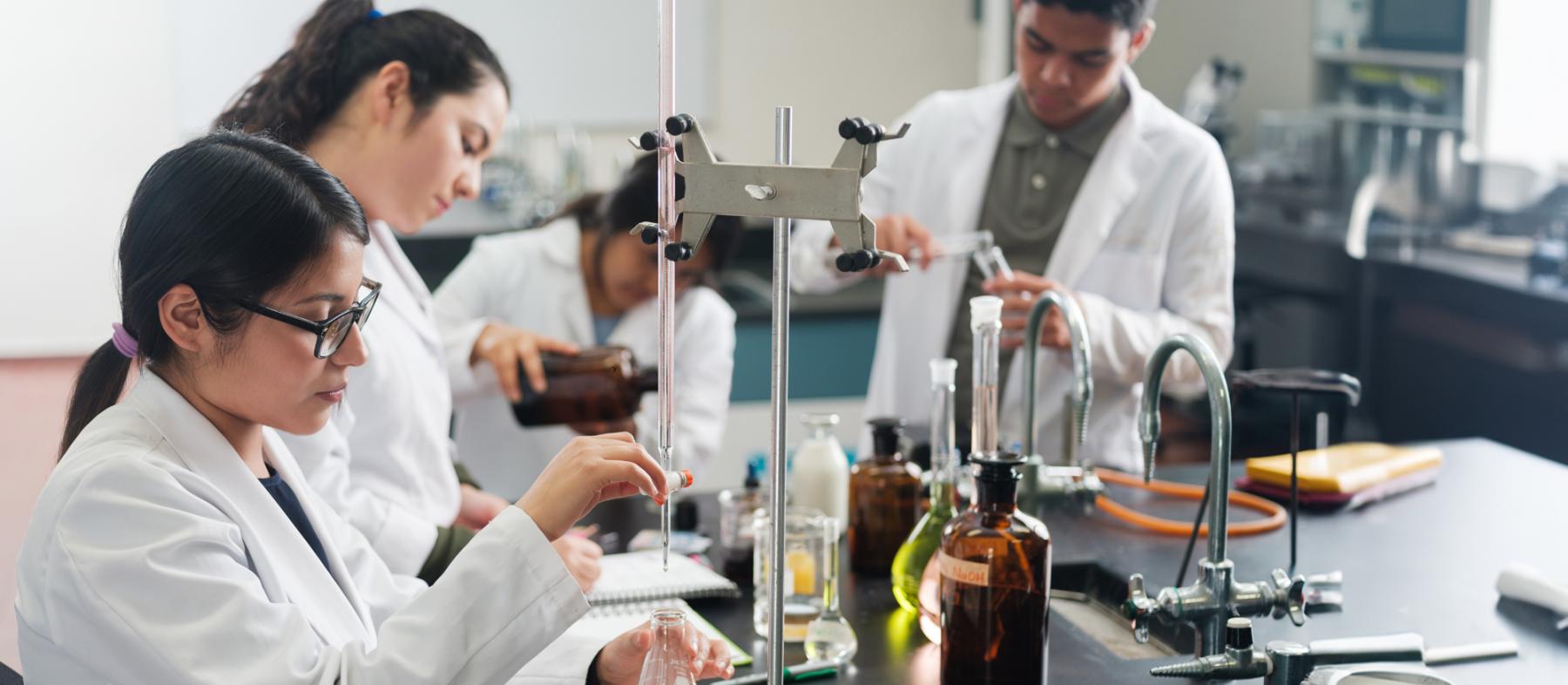 A group of students in a biology lab