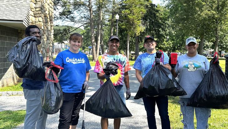 The trash at Elm Park didn't stand a chance with this team: (from left) Adjunct Faculty Member Henry Chambers, Coordinator of Career Services Nichole Wheeler, Coordinator of Transfer & Articulation Oscar Chavez, Director of Foundational Excellence and Student Development Gabe Santner and First Generation Student Association SantaMaria Sessarego