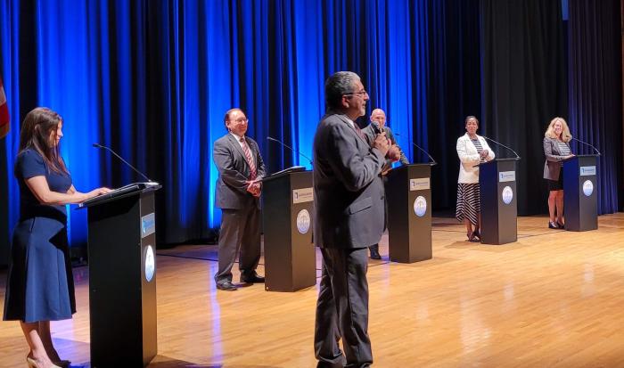 Dr. Luis Pedraja giving a welcome at the forum. Dr. Luis Pedraja giving a welcome at the forum.