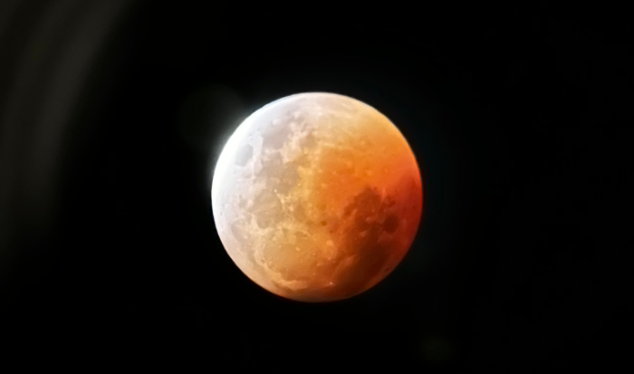 A beautiful shot of the "blood moon" during the total lunar eclipse A beautiful shot of the "blood moon" during the total lunar eclipse