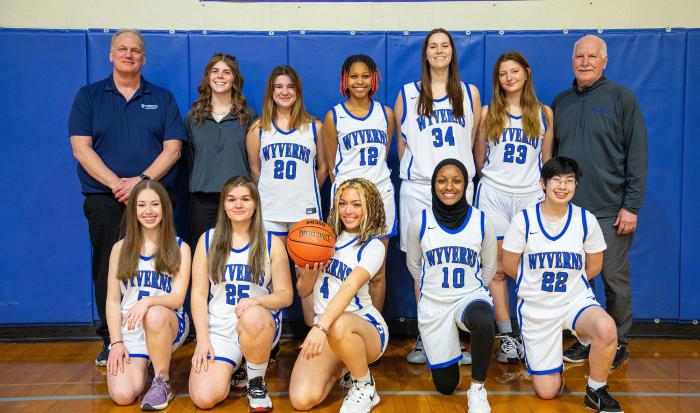 The Women's Basketball team with coaches Rich Small (left, back row) and James Griffin (right, back row) The Women's Basketball team with coaches Rich Small (left, back row) and James Griffin (right, back row)