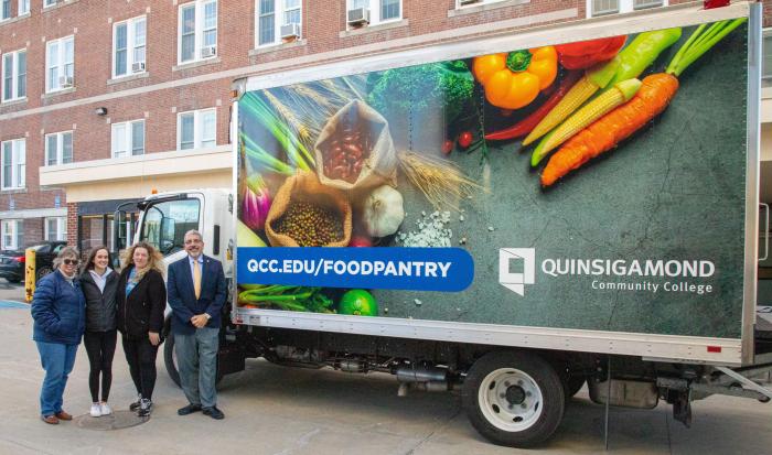 Manager for Student Resources Bonnie Coleman, Food Pantry Staff Julia Rooney, Food Pantry Staff Cheryl Marrino and President Dr. Luis Pedraja