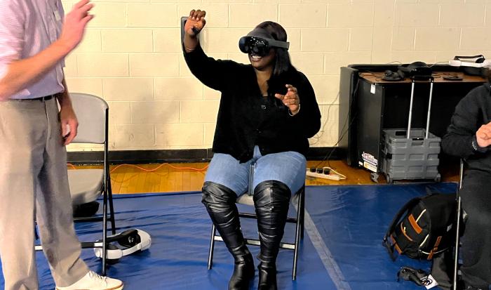 A student uses virtual reality technology during the Transfer and Technology Fair. A student uses virtual reality technology during the Transfer and Technology Fair.