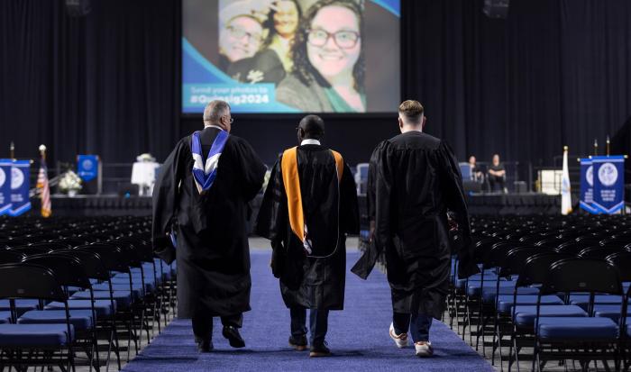 Preparing for QCC's 2024 commencement ceremony Preparing for QCC's 2024 commencement ceremony