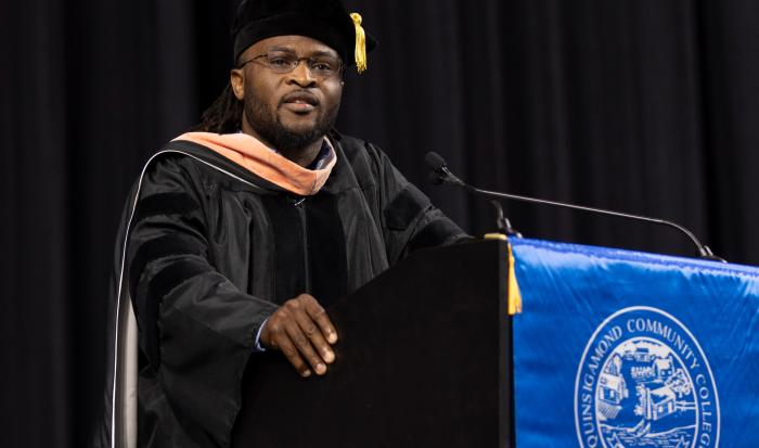 Faculty speaker Opeyemi Odewale at QCC's 2024 commencement ceremony Faculty speaker Opeyemi Odewale at QCC's 2024 commencement ceremony