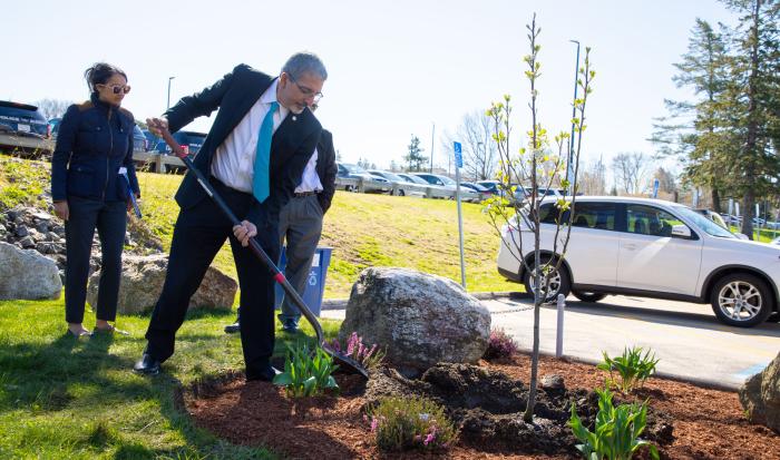 QCC President Dr. Luis Pedraja helps to plant a new tree for Earth Day. QCC President Dr. Luis Pedraja helps to plant a new tree for Earth Day.