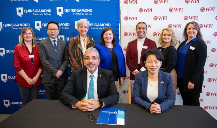 (back row, from left) Clerk IV for Career Services & CPL Brenda Kuchnicki, Assistant VP of Academic Affairs Kevin Li, Interim VP of Academic Affairs Kathy Rentsch, Executive Director of Advising, Testing, Career & Transfer Services Amy Carmack, Career & Transfer Counselor Oscar Chavez, Coordinator of Transfer & Articulation Beth Fullerton and Asst. Director of Career and Transfer Services Laura Hunter. (front row, from left) QCC President Dr. Luis Pedraja and WPI President Dr. Grace Wang. (back row, from left) Clerk IV for Career Services & CPL Brenda Kuchnicki, Assistant VP of Academic Affairs Kevin Li, Interim VP of Academic Affairs Kathy Rentsch, Executive Director of Advising, Testing, Career & Transfer Services Amy Carmack, Career & Transfer Counselor Oscar Chavez, Coordinator of Transfer & Articulation Beth Fullerton and Asst. Director of Career and Transfer Services Laura Hunter. (front row, from left) QCC President Dr. Luis Pedraja and WPI President Dr. Grace Wang.