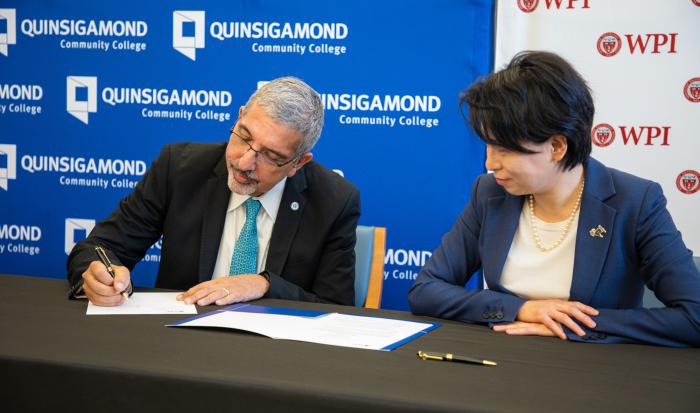 QCC President Dr. Luis Pedraja (left) signing the articulation agreement with WPI President Dr. Grace Wang. QCC President Dr. Luis Pedraja (left) signing the articulation agreement with WPI President Dr. Grace Wang.