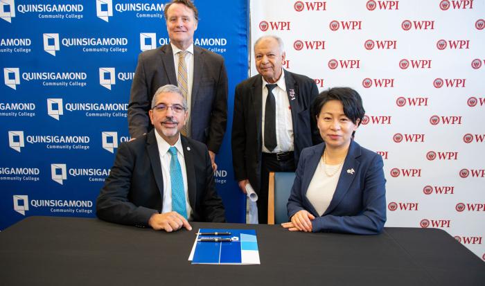 (back row, from left) Mass. State Senator Michael Moore, Professor/Coordinator of Engineering Dadbeh Bigonahy. (front row, from left) QCC President Dr. Luis Pedraja and WPI President Dr. Grace Wang (back row, from left) Mass. State Senator Michael Moore, Professor/Coordinator of Engineering Dadbeh Bigonahy. (front row, from left) QCC President Dr. Luis Pedraja and WPI President Dr. Grace Wang