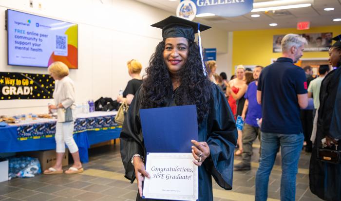 Graduate Drupatie Singh at the HSE/GED graduation ceremony. Graduate Drupatie Singh at the HSE/GED graduation ceremony.