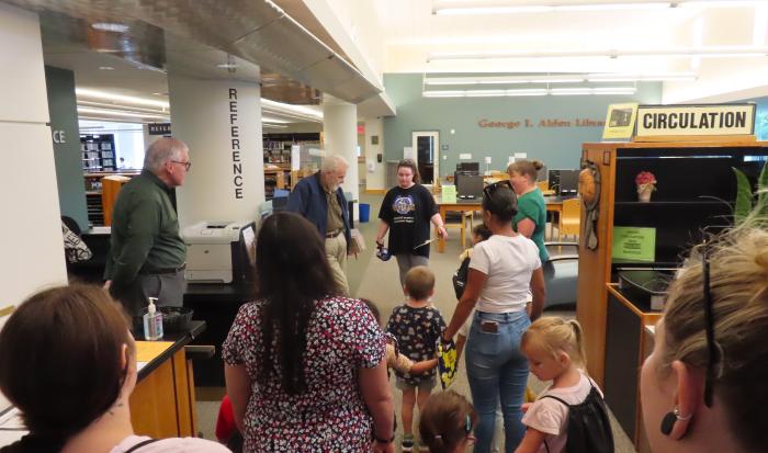 The children get a peek at QCC's library and talk to a professor