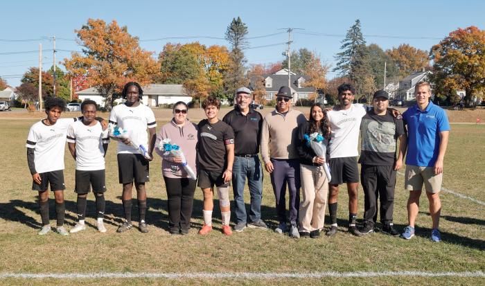 Second year players from the Men's Soccer team with their supporters and QCC President Dr. Luis Pedraja (sixth from right) Second year players from the Men's Soccer team with their supporters and QCC President Dr. Luis Pedraja (sixth from right)