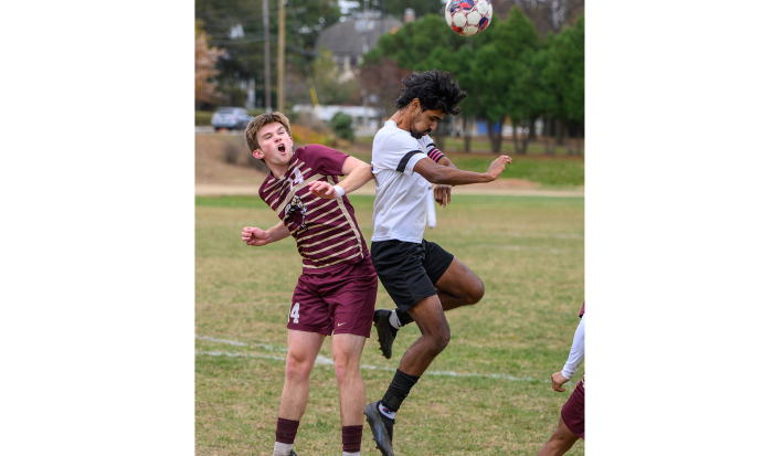 Going head to head at the men's soccer game Going head to head at the men's soccer game