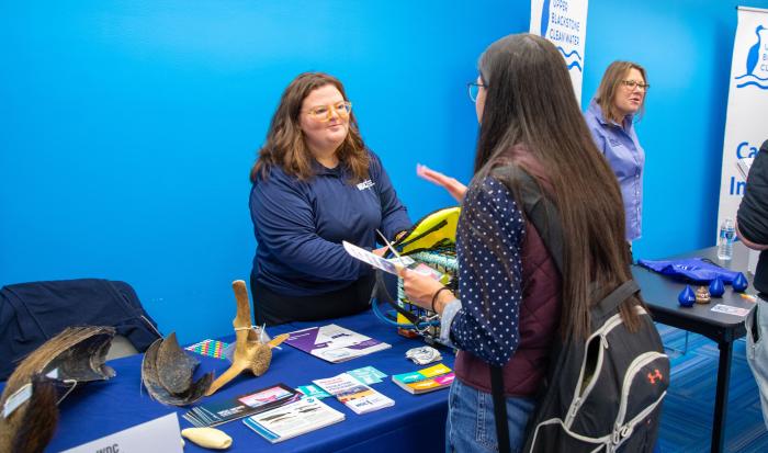 The Whale and Dolphin Conservation table drew a large crowd with items such a whale teeth and baleen The Whale and Dolphin Conservation table drew a large crowd with items such a whale teeth and baleen