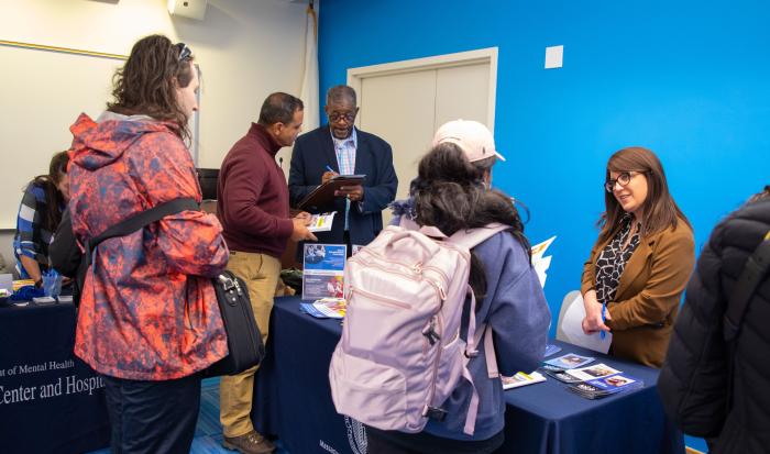 Job seekers get information from the Mass. Commission for the Blind. Job seekers get information from the Mass. Commission for the Blind.
