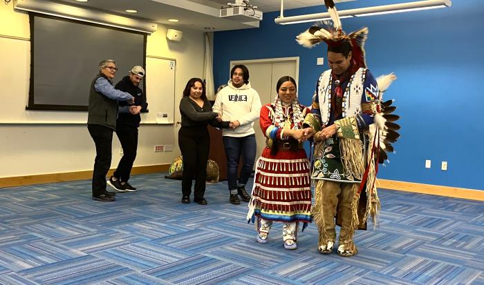 Presenters and audience members joined the alligator dance, a traditional couples dance. Presenters and audience members joined the alligator dance, a traditional couples dance.