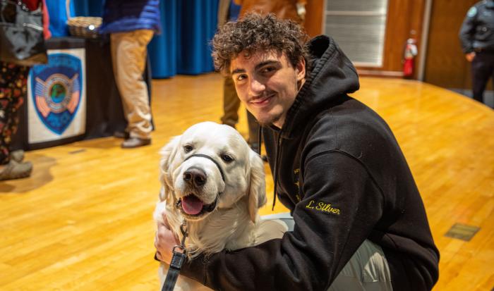 Students gravitate towards QCC's newest Campus Police officer. Students gravitate towards QCC's newest Campus Police officer.