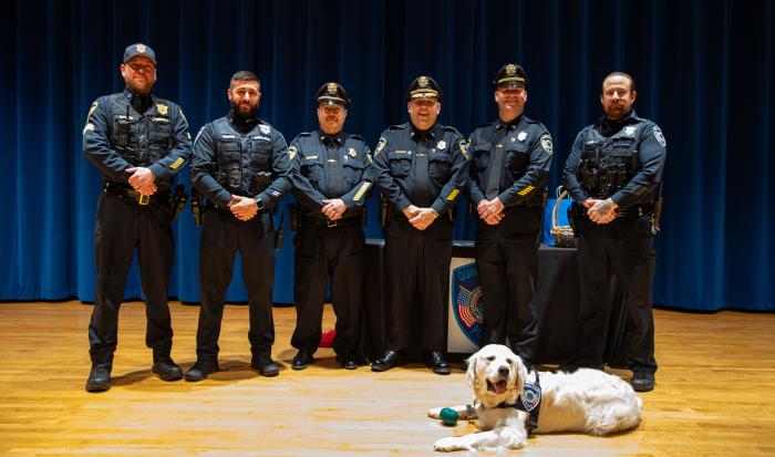 (From left) Officer Daniel Litchfield, Community Resource Officer Nick Yacuzzi, Administrative Deputy Chief Rey Rodriguez, Chief of Police Steve DiGiovanni, Operations Deputy Chief Mike Vigeant and Officer Anthony Simo with Siggy (From left) Officer Daniel Litchfield, Community Resource Officer Nick Yacuzzi, Administrative Deputy Chief Rey Rodriguez, Chief of Police Steve DiGiovanni, Operations Deputy Chief Mike Vigeant and Officer Anthony Simo with Siggy